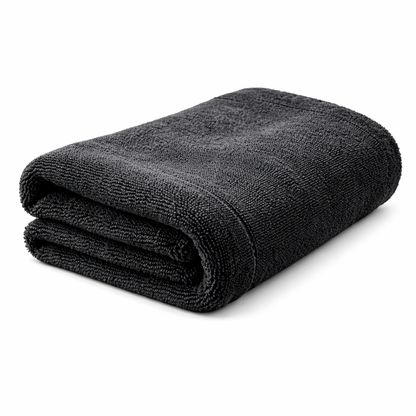 Folded gray microfiber towel on a white background side view