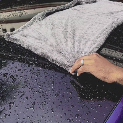 Gray Microfiber cloth Cleaning video on a car top area